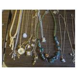 Necklaces, pendants, pins and earri...