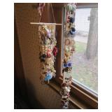 Hangable jewelry sash loaded to cap...