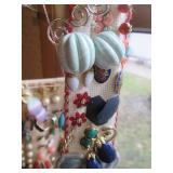 Hangable jewelry sash loaded to cap...