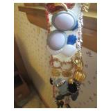 Hangable jewelry sash loaded to cap...