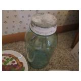 Lidded colored glass jars, lidded c...