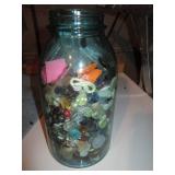 Blue Glass canning jar containing a...