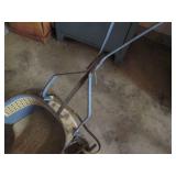 Antique metal walker style stroller...