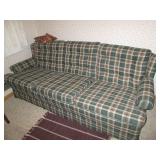Plaid couch in good condition...