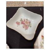 Collection of Vintage Porcelain Plates and Decorative Items