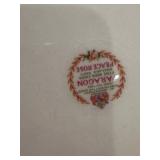 Collection of Vintage Porcelain Plates and Decorative Items