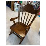 Vintage Wooden Rocking Chair with Ornate Backrest