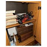Oak Wood Cabinet with Assorted VHS Movies and Cassette Tapes