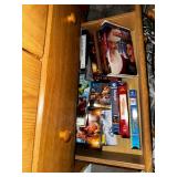 Oak Wood Cabinet with Assorted VHS Movies and Cassette Tapes