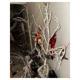 Collection of Holiday and Christmas Decorations Including Trees and Ornaments