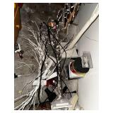 Collection of Holiday and Christmas Decorations Including Trees and Ornaments