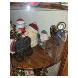 Collection of Christmas Santa Figurines and Holiday Decor