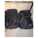 Collection of Black Rolling Suitcases and Assorted Holiday Decorations