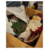 Collection of Holiday Decorations: Wrapping Paper, Wreaths, and Figurines