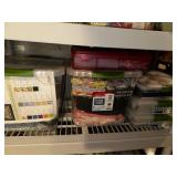 Collection of Quilting Fabrics and Supplies in Storage Totes
