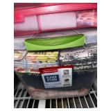 Collection of Quilting Fabrics and Supplies in Storage Totes