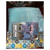 Collection of Quilting Fabrics and Supplies in Storage Totes