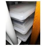 Collection of Quilting Fabrics and Supplies in Storage Totes