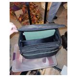 Rolling Laptop Bag with Assorted Craft Supplies and Fabrics