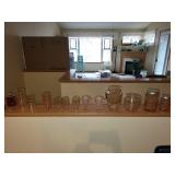 Set of Vintage Pink Glassware Including Pitcher, Tumblers, and Decorative Pieces