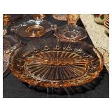 Collection of Amber Glass Serving Dishes with Etched Patterns