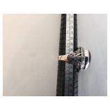 Vintage Silver Ring with Captivating Stone and Intricate Design