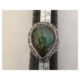 Vintage Silver Ring with Captivating Stone and Intricate Design