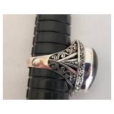 Vintage Silver Ring with Captivating Stone and Intricate Design