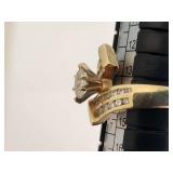 14k Gold Ring with Marquise-Cut Diamond and Accent Stones (Likely Diamonds)