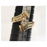 14k Gold Ring with Marquise-Cut Diamond and Accent Stones (Likely Diamonds)