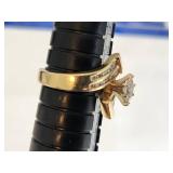 14k Gold Ring with Marquise-Cut Diamond and Accent Stones (Likely Diamonds)