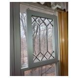 Two Stained Glass Panels with Geometric Pattern in White Frame