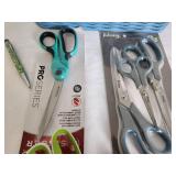 Collection of Scissors and Pen with Blue Basket