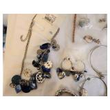 Assorted Jewelry Collection with Watches, Bracelets, and Earrings