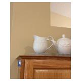 Collection of 7 White Porcelain Pitchers and Teapots