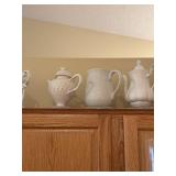 Collection of 7 White Porcelain Pitchers and Teapots