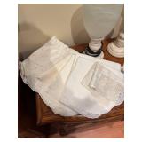 Assortment of Vintage Candle Holders, Frosted Vase, and Lace Linens