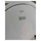 White Office Chair with Beige Cushion and Ornate Mirror