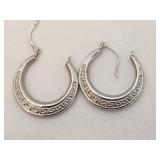 Collection of 4 Pairs of Silver Tone Hoop Earrings