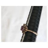 Purple Gemstone Ring with Intricate Setting