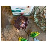 Collection of Garden Decor: Metal Sculptures and Solar Lanterns