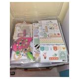 Collection of Crafting Supplies in Clear Organizers