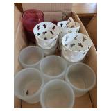 Collection of Scented Candles and Votive Holders