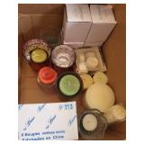 Collection of Scented Candles and Votive Holders