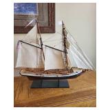 Vintage Ship Model with Detailed Sails and Wooden Base