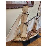 Vintage Ship Model with Detailed Sails and Wooden Base