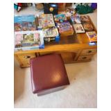 Collection of DVDs, Puzzles, and Storage Ottoman