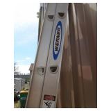 Werner 12 - 14 extended ladder. Slight on one side. As shown.