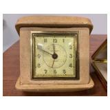 Two travel clocks