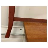 Hand Saw with wooden handle.